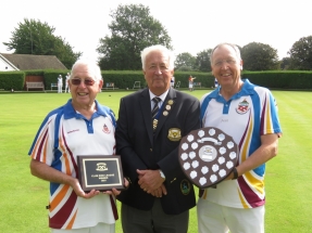 Gordon Burrows and Roy Polley of Harpenden receive the Club Rink League Shield