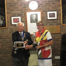 President Terry Atkinson presenting the Jones Cup to Gary Walton of Welwyn Gafrden City
